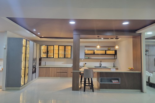A modern kitchen with bar stools